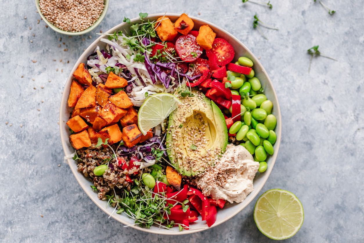 Image of a Colourful vegan bowl with quinoa and sweet potato